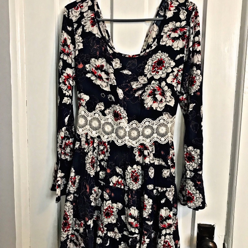 Short dress with long flare sleeve